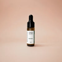Green Glow product photo on the blush background